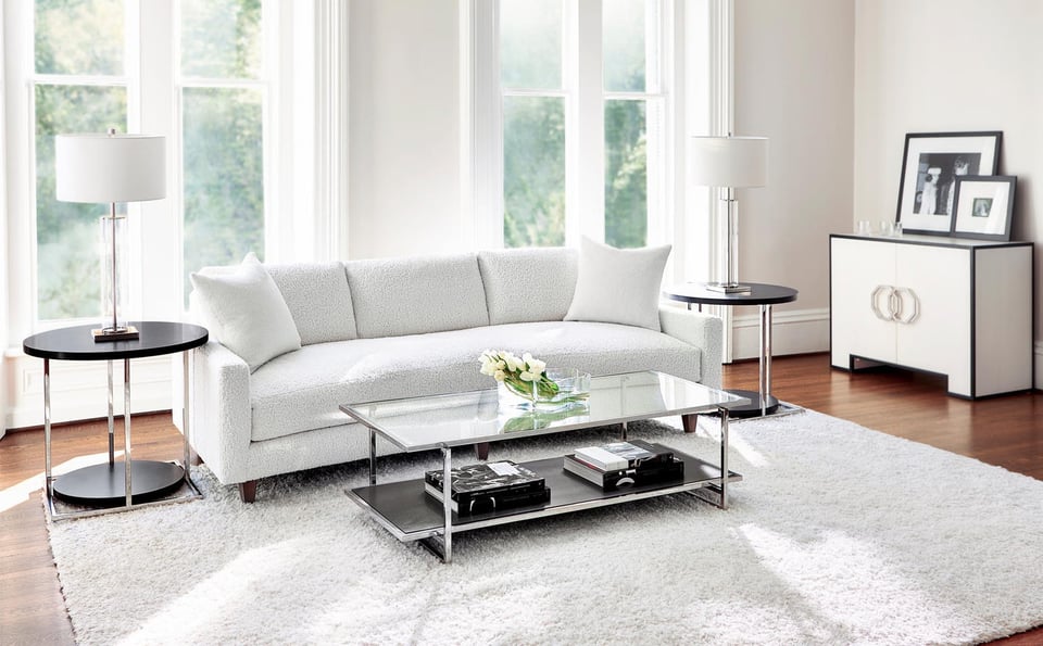 Bernhardt sofa with side tables and coffee table over white rug