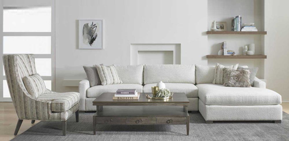 sofa chaise with accent chair in a living room with wooden coffee table