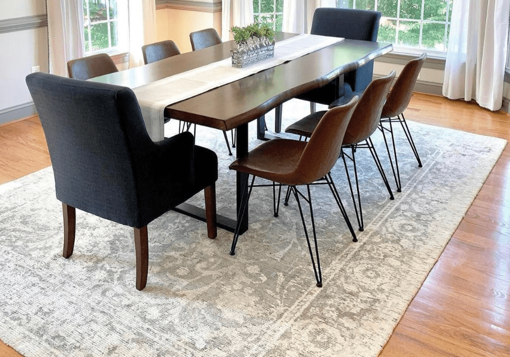 dining set with live edge table and eight chairs over an area rug