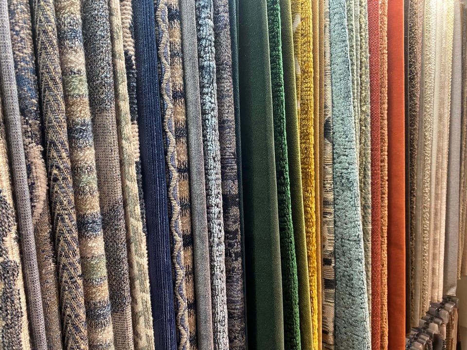 a selection of furniture fabric on display